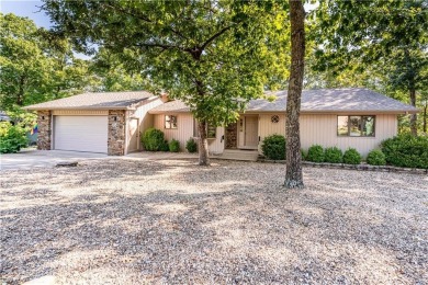 Located in a friendly, social neighborhood near the golf course on Holiday Island Golf Course in Arkansas - for sale on GolfHomes.com, golf home, golf lot