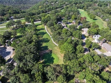 Located in a friendly, social neighborhood near the golf course on Holiday Island Golf Course in Arkansas - for sale on GolfHomes.com, golf home, golf lot