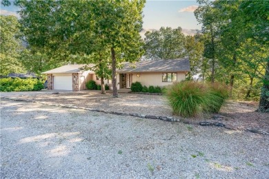 Located in a friendly, social neighborhood near the golf course on Holiday Island Golf Course in Arkansas - for sale on GolfHomes.com, golf home, golf lot