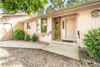 Located in a friendly, social neighborhood near the golf course on Holiday Island Golf Course in Arkansas - for sale on GolfHomes.com, golf home, golf lot