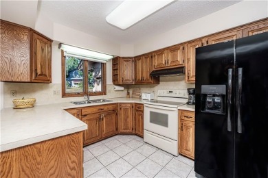 Located in a friendly, social neighborhood near the golf course on Holiday Island Golf Course in Arkansas - for sale on GolfHomes.com, golf home, golf lot