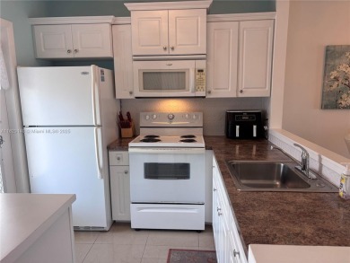 Are you looking for a condo well priced, not far from the beach on Lauderhill Golf Course in Florida - for sale on GolfHomes.com, golf home, golf lot