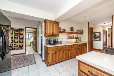 Located in a friendly, social neighborhood near the golf course on Holiday Island Golf Course in Arkansas - for sale on GolfHomes.com, golf home, golf lot