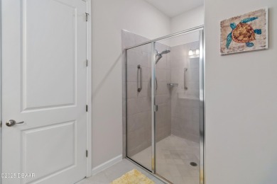 Welcome to easy, one-level living in the desirable Scottmoor on Halifax Plantation Golf Club in Florida - for sale on GolfHomes.com, golf home, golf lot
