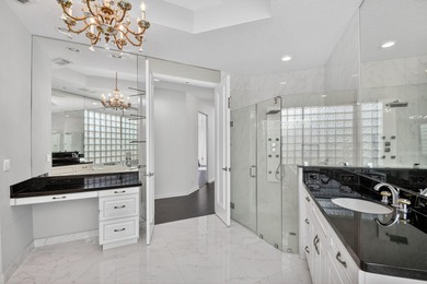 Located on an exceptional corner lot, this magnificent BAYVIEW on Wycliffe Golf and Country Club in Florida - for sale on GolfHomes.com, golf home, golf lot