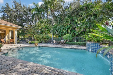 Located on an exceptional corner lot, this magnificent BAYVIEW on Wycliffe Golf and Country Club in Florida - for sale on GolfHomes.com, golf home, golf lot