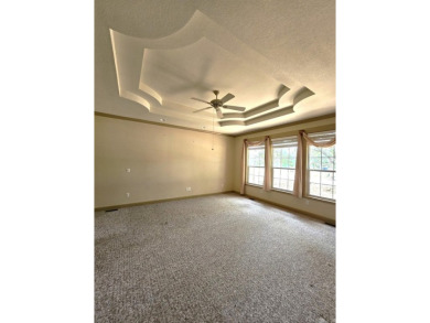 Nice all-brick home with vinyl accents located on Magellan Golf on Magellan Golf Course in Arkansas - for sale on GolfHomes.com, golf home, golf lot