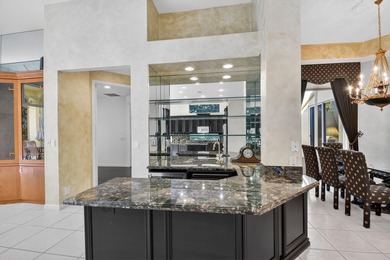 Located on an exceptional corner lot, this magnificent BAYVIEW on Wycliffe Golf and Country Club in Florida - for sale on GolfHomes.com, golf home, golf lot