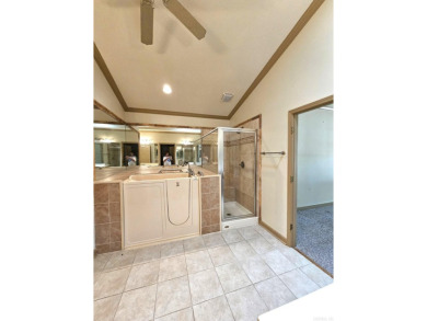 Nice all-brick home with vinyl accents located on Magellan Golf on Magellan Golf Course in Arkansas - for sale on GolfHomes.com, golf home, golf lot