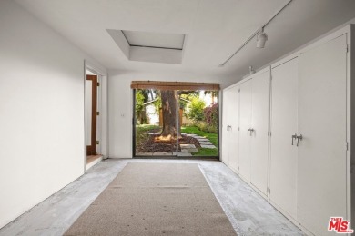 Tucked away in the heart of Woodland Hills, situated on a quiet on Woodland Hills Country Club in California - for sale on GolfHomes.com, golf home, golf lot