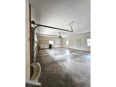 Nice all-brick home with vinyl accents located on Magellan Golf on Magellan Golf Course in Arkansas - for sale on GolfHomes.com, golf home, golf lot