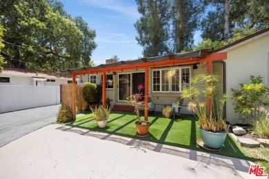 Tucked away in the heart of Woodland Hills, situated on a quiet on Woodland Hills Country Club in California - for sale on GolfHomes.com, golf home, golf lot
