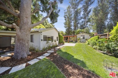 Tucked away in the heart of Woodland Hills, situated on a quiet on Woodland Hills Country Club in California - for sale on GolfHomes.com, golf home, golf lot