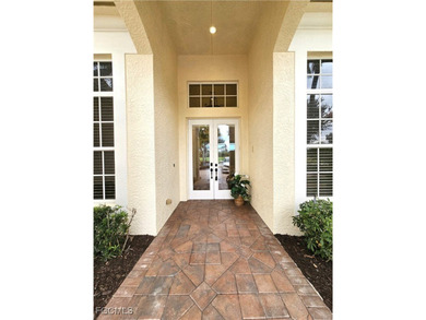 As you drive into Shadow Wood Preserve (SWP), you're greeted by on  in Florida - for sale on GolfHomes.com, golf home, golf lot