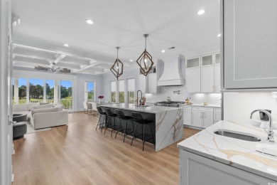 Welcome to 496 West Palms, a breathtaking waterfront sanctuary on Myrtlewood Golf Course and Club  in South Carolina - for sale on GolfHomes.com, golf home, golf lot
