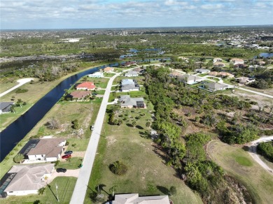 A cleared residential building lot backing up to the 1st Tee Box on Rotonda Golf and Country Club - Long Marsh  in Florida - for sale on GolfHomes.com, golf home, golf lot