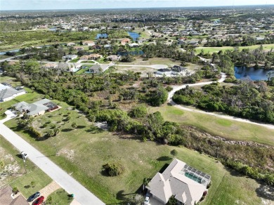 A cleared residential building lot backing up to the 1st Tee Box on Rotonda Golf and Country Club - Long Marsh  in Florida - for sale on GolfHomes.com, golf home, golf lot