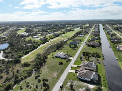 A cleared residential building lot backing up to the 1st Tee Box on Rotonda Golf and Country Club - Long Marsh  in Florida - for sale on GolfHomes.com, golf home, golf lot