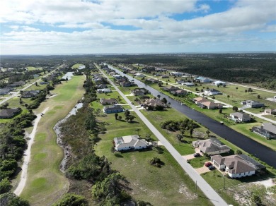 A cleared residential building lot backing up to the 1st Tee Box on Rotonda Golf and Country Club - Long Marsh  in Florida - for sale on GolfHomes.com, golf home, golf lot