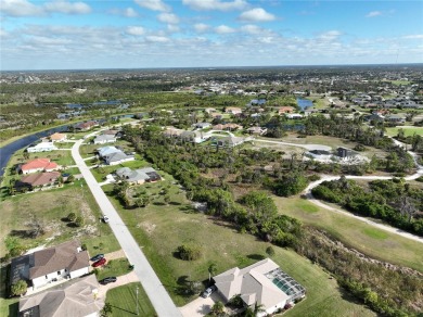 A cleared residential building lot backing up to the 1st Tee Box on Rotonda Golf and Country Club - Long Marsh  in Florida - for sale on GolfHomes.com, golf home, golf lot