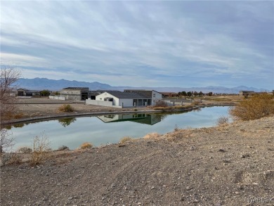 Prime corner golf course lot located in the desired gated golf on Los Lagos Golf Club in Arizona - for sale on GolfHomes.com, golf home, golf lot