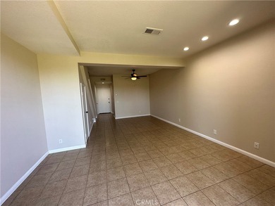 Great view! two-story of La Vista condo with dual master suites on El Niguel Country Club in California - for sale on GolfHomes.com, golf home, golf lot