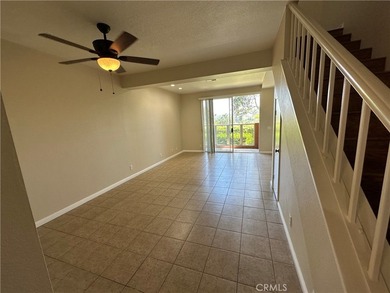 Great view! two-story of La Vista condo with dual master suites on El Niguel Country Club in California - for sale on GolfHomes.com, golf home, golf lot