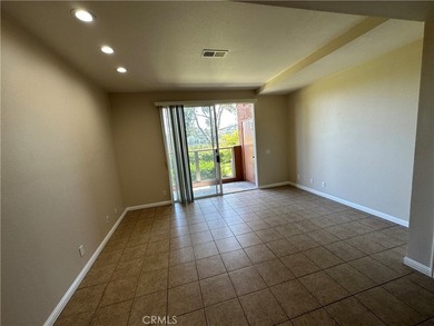 Great view! two-story of La Vista condo with dual master suites on El Niguel Country Club in California - for sale on GolfHomes.com, golf home, golf lot