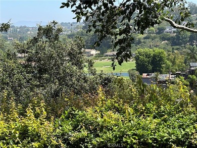 Great view! two-story of La Vista condo with dual master suites on El Niguel Country Club in California - for sale on GolfHomes.com, golf home, golf lot