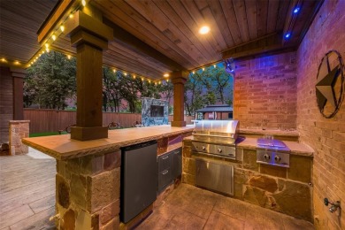 Stunning luxury home on a huge corner lot in the only 24-7 gated on The Golf Club at Resort Eagle Mountain Lake in Texas - for sale on GolfHomes.com, golf home, golf lot