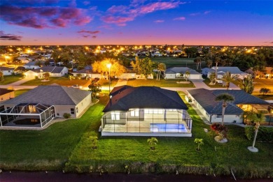 MODERN living in this brand-new Rotonda West residence is proof on Rotonda Golf and Country Club The Palms Course in Florida - for sale on GolfHomes.com, golf home, golf lot