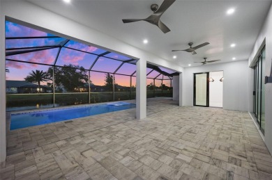 MODERN living in this brand-new Rotonda West residence is proof on Rotonda Golf and Country Club The Palms Course in Florida - for sale on GolfHomes.com, golf home, golf lot