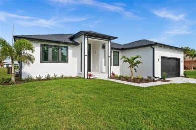 MODERN living in this brand-new Rotonda West residence is proof on Rotonda Golf and Country Club The Palms Course in Florida - for sale on GolfHomes.com, golf home, golf lot