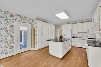 Welcome to 122 Hidden Hills Drive, a stunning Charleston-style on Greenville Country Club in South Carolina - for sale on GolfHomes.com, golf home, golf lot