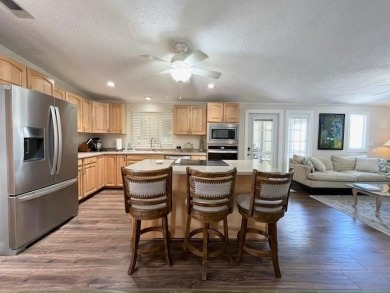 Absolutely stunning 2-bd, 2-ba home with modern updates & a on Del Tura Golf and Country Club in Florida - for sale on GolfHomes.com, golf home, golf lot
