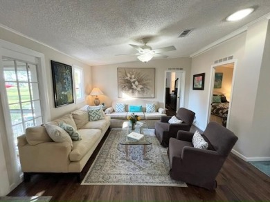 Absolutely stunning 2-bd, 2-ba home with modern updates & a on Del Tura Golf and Country Club in Florida - for sale on GolfHomes.com, golf home, golf lot