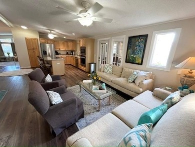 Absolutely stunning 2-bd, 2-ba home with modern updates & a on Del Tura Golf and Country Club in Florida - for sale on GolfHomes.com, golf home, golf lot