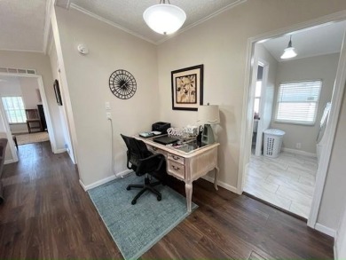 Absolutely stunning 2-bd, 2-ba home with modern updates & a on Del Tura Golf and Country Club in Florida - for sale on GolfHomes.com, golf home, golf lot