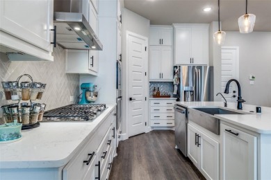 Executive 3 bedroom, 2 and a half bathroom home with an attached on Royal Oaks Country Club in Texas - for sale on GolfHomes.com, golf home, golf lot