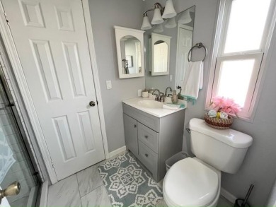 Absolutely stunning 2-bd, 2-ba home with modern updates & a on Del Tura Golf and Country Club in Florida - for sale on GolfHomes.com, golf home, golf lot