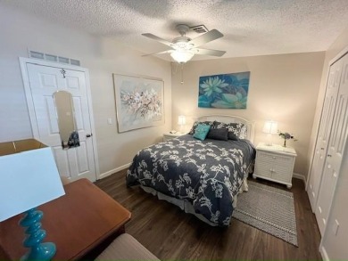 Absolutely stunning 2-bd, 2-ba home with modern updates & a on Del Tura Golf and Country Club in Florida - for sale on GolfHomes.com, golf home, golf lot
