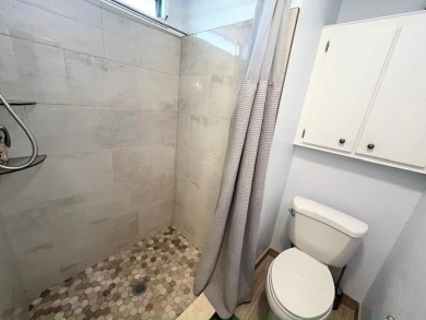 Absolutely stunning 2-bd, 2-ba home with modern updates & a on Del Tura Golf and Country Club in Florida - for sale on GolfHomes.com, golf home, golf lot