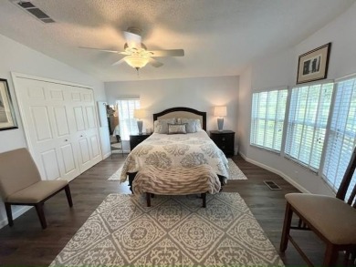 Absolutely stunning 2-bd, 2-ba home with modern updates & a on Del Tura Golf and Country Club in Florida - for sale on GolfHomes.com, golf home, golf lot