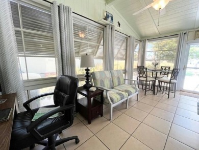 Absolutely stunning 2-bd, 2-ba home with modern updates & a on Del Tura Golf and Country Club in Florida - for sale on GolfHomes.com, golf home, golf lot