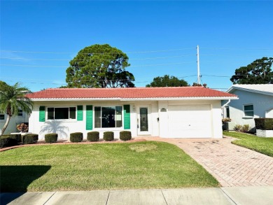 Wow!! Amazing home which has been remodeled beautifully in the on Mainlands Golf Club in Florida - for sale on GolfHomes.com, golf home, golf lot