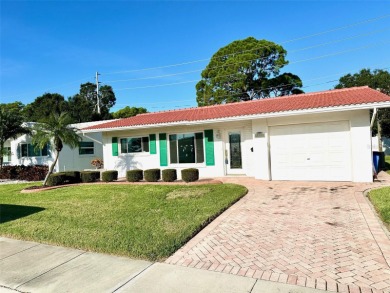Wow!! Amazing home which has been remodeled beautifully in the on Mainlands Golf Club in Florida - for sale on GolfHomes.com, golf home, golf lot