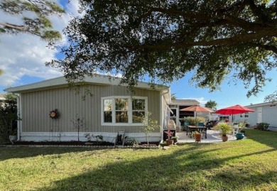 Absolutely stunning 2-bd, 2-ba home with modern updates & a on Del Tura Golf and Country Club in Florida - for sale on GolfHomes.com, golf home, golf lot