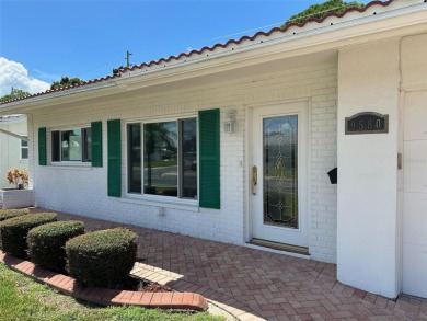 Wow!! Amazing home which has been remodeled beautifully in the on Mainlands Golf Club in Florida - for sale on GolfHomes.com, golf home, golf lot