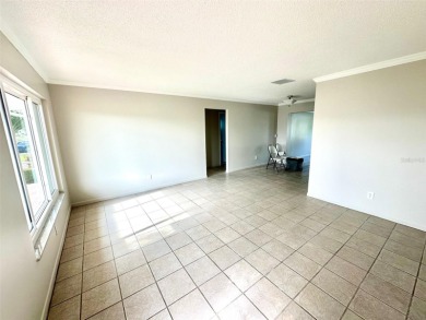 Wow!! Amazing home which has been remodeled beautifully in the on Mainlands Golf Club in Florida - for sale on GolfHomes.com, golf home, golf lot