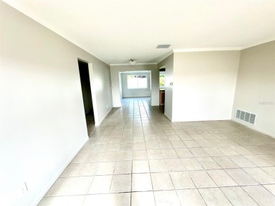 Wow!! Amazing home which has been remodeled beautifully in the on Mainlands Golf Club in Florida - for sale on GolfHomes.com, golf home, golf lot